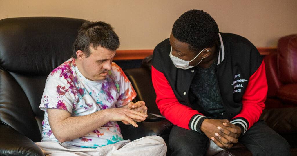 Verland resident with caretaker