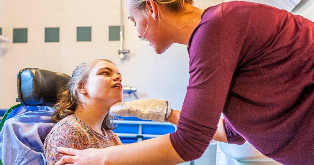 caregiver with resident